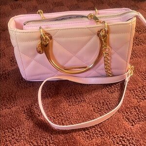 Elegant Pink Quilted Handbag with Gold Accents
